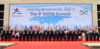 參加第九屆亞歐峰會的領導人拍攝“全家福”