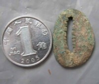 銅貝與1角硬幣