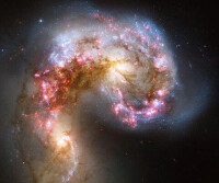 Spitzer Sets Sights on Galactic Collision