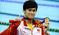 為中國第一個男子游泳奧運冠軍