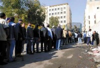 2011年11月，大馬士革居民27日在一處加油站排隊購買罐裝燃氣