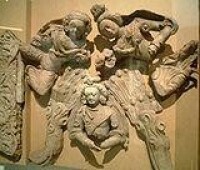 來自新疆圖木舒克的6世紀—7世紀的陶俑，現藏於巴黎吉美博物館。